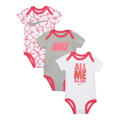 Nike Pack of three baby girls' pink white and grey bodysuits
